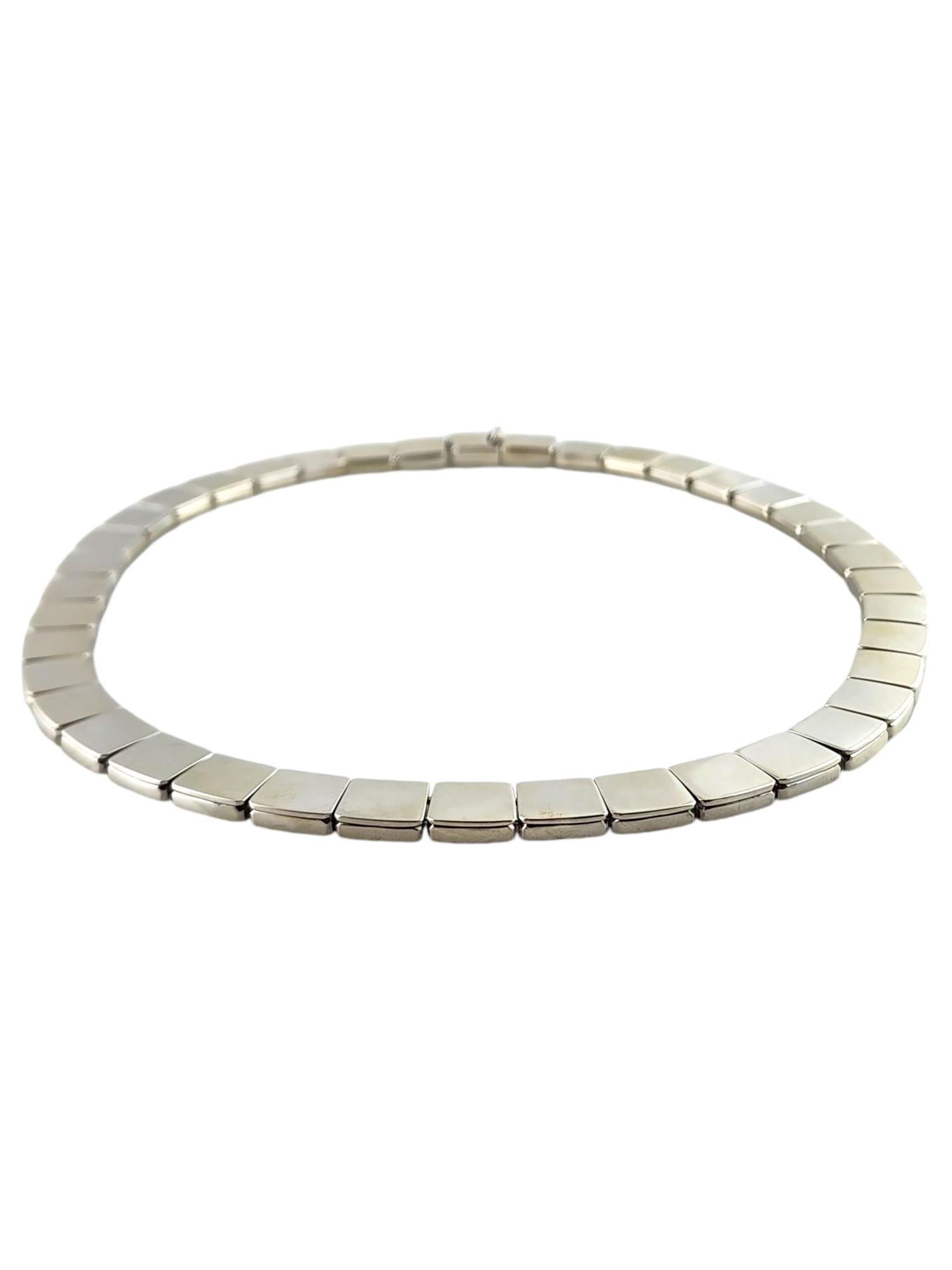 2002 Tiffany & Co. Italy Sterling Silver Square Tiles Necklace 

This gorgeous square necklace was meticulously crafted from sterling silver by amazing designer Tiffany & Co.!

Length: 17 1/2
