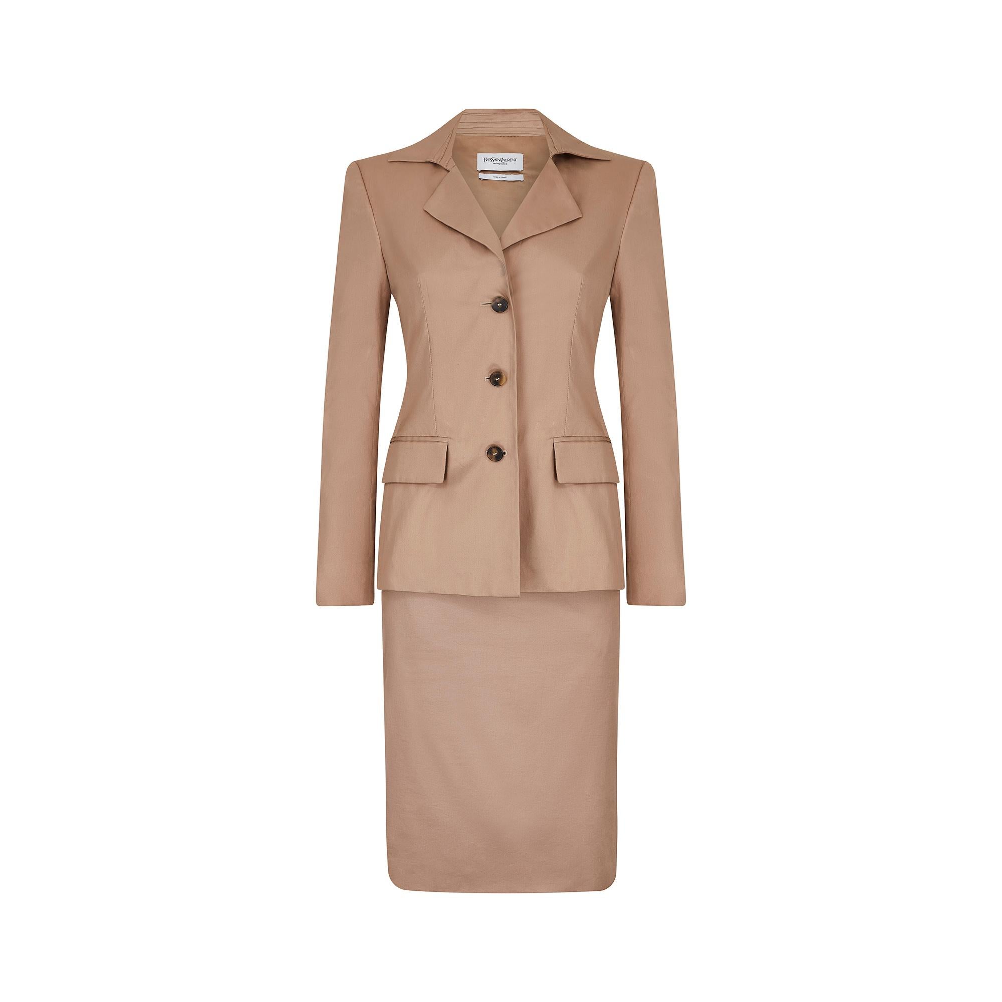Spring / summer 2002 Tom Ford for Yves Saint Laurent khaki skirt suit from the famed safari collection. This safari-esque tailoring is something of a signature look, made popular by Yves Saint Laurent in 1968 with the now infamous Saharienne dress. 
