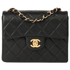 2003 Chanel Schwarze Mini-Klappentasche aus gestepptem Lammfell