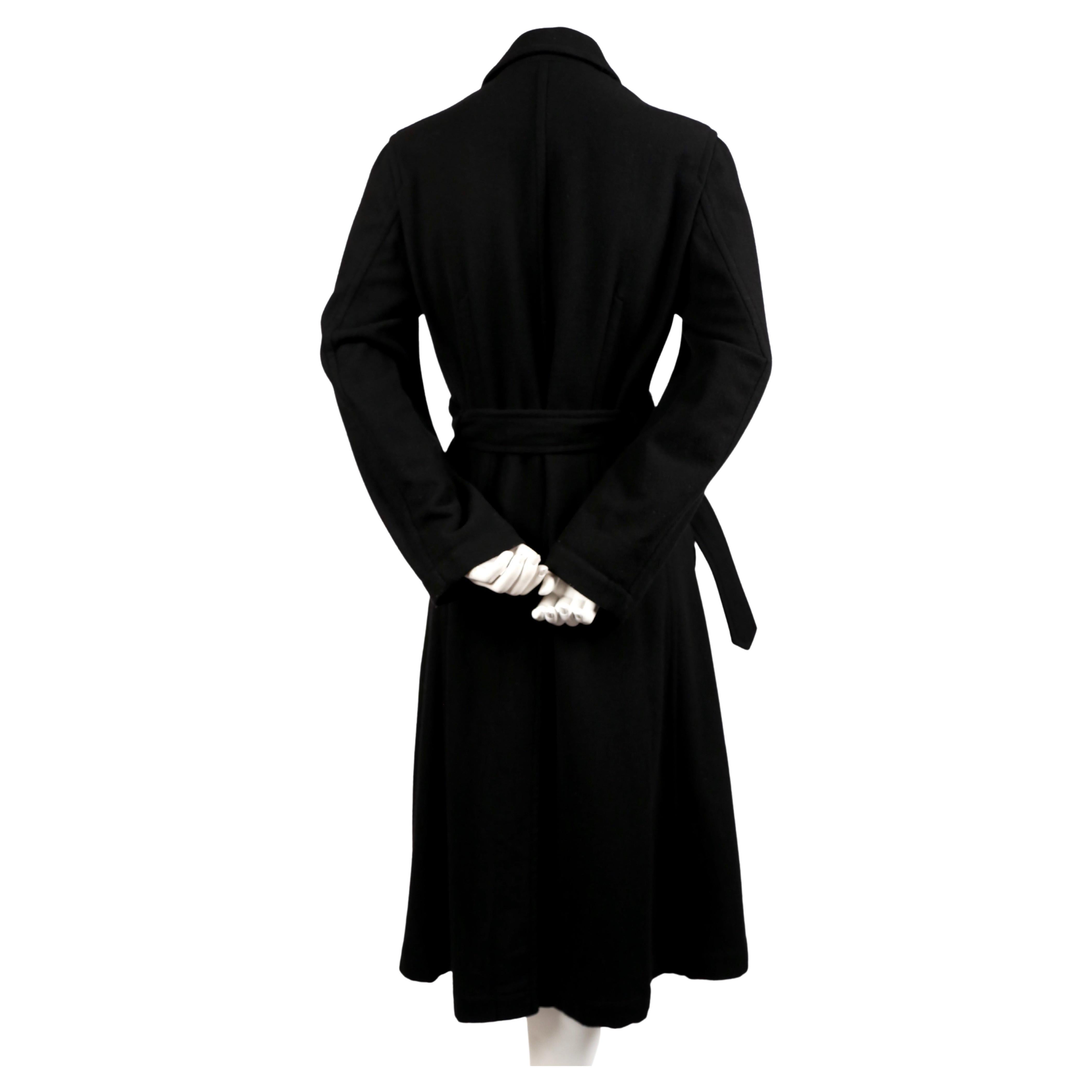 Women's or Men's 2003 COMME DES GARCONS jet black wool coat with knot detail For Sale