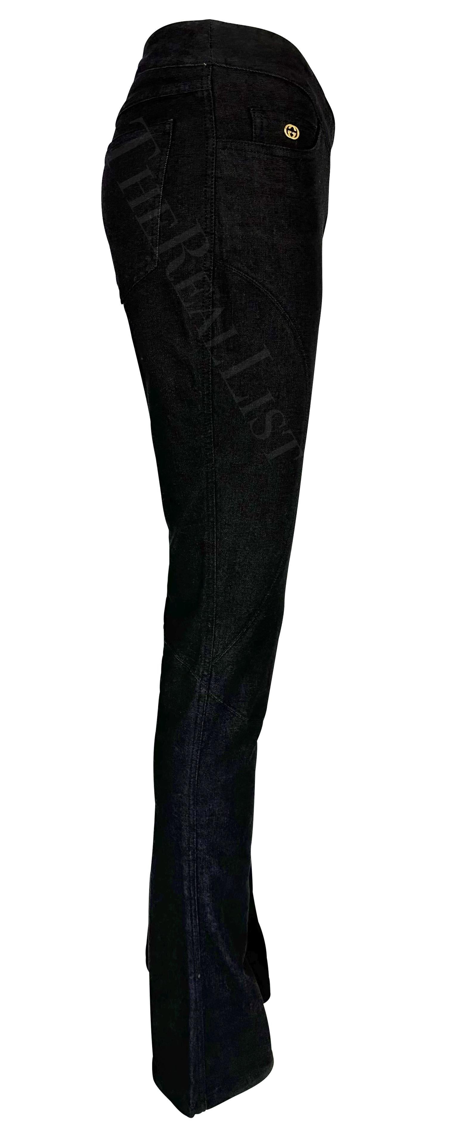 Women's 2003 Gucci by Tom Ford GG Medallion Black Denim Flare Low-Rise Jeans For Sale