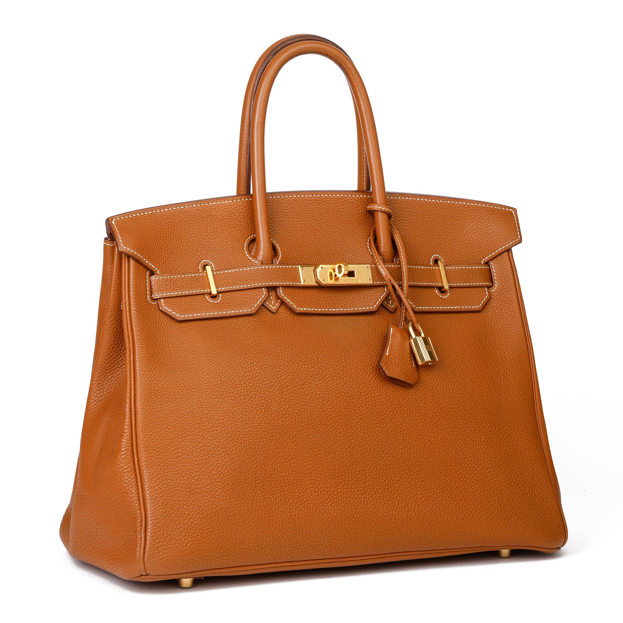 HERMÈS
Gold Togo Leather Birkin 35cm

Xupes Reference: CB289
Serial Number: [G]
Age (Circa): 2003
Accompanied By: Hermès Dust Bag, Lock, Keys, Clochette
Authenticity Details: Date Stamp (Made in France) 
Gender: Ladies
Type: Tote

Colour: