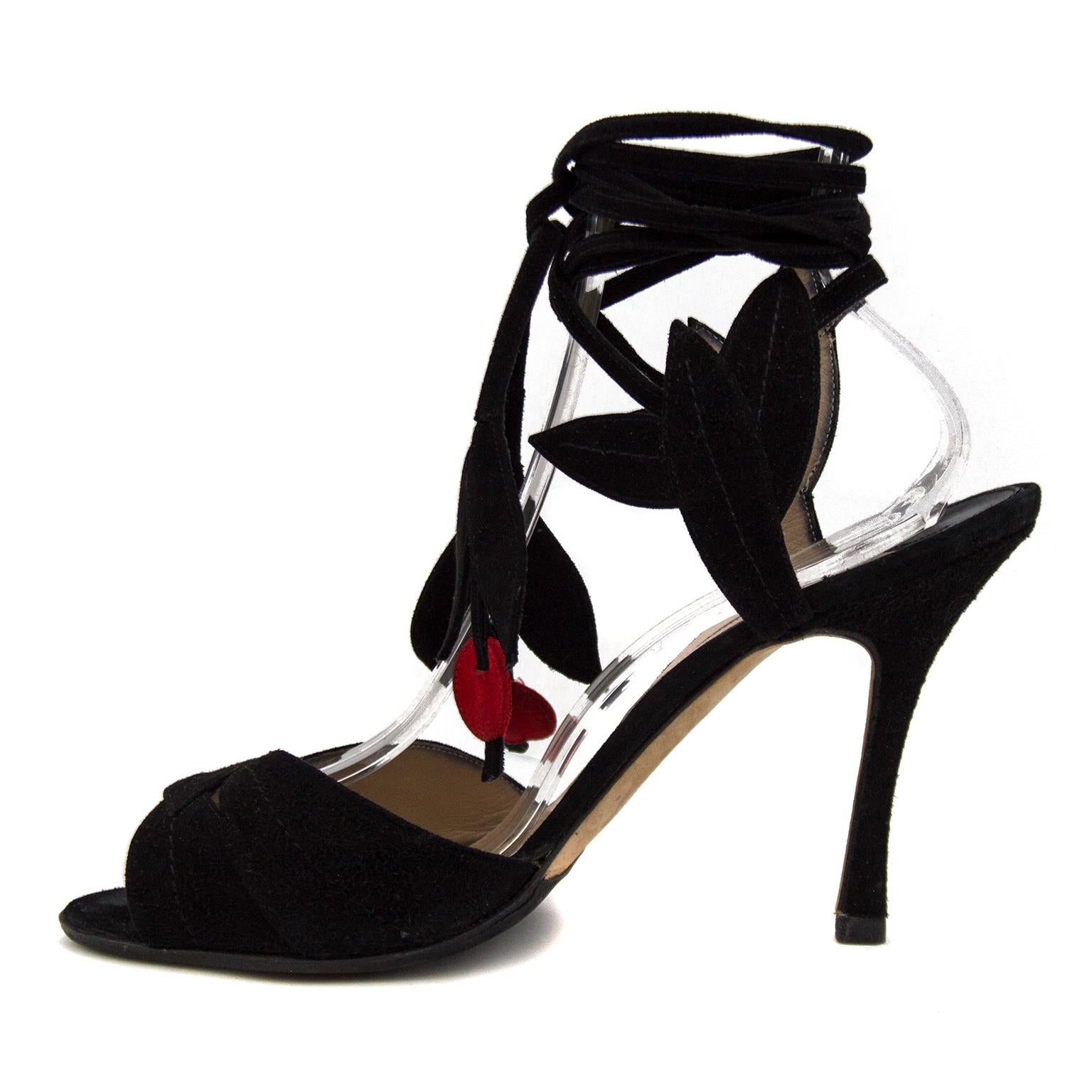  A truly whimsical shoe, this black suede sandal was originally created for Ossie Clark’s catwalk show by Manolo Blahnik in 1971. This was shortly before Blahnik opened his first boutique in London in 1973. The shoe was re-made for the Victoria &