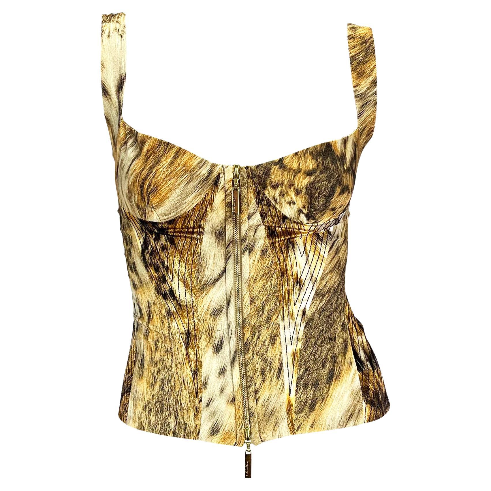 Presenting a beautiful Roberto Cavalli leopard animal print bustier corset top. From 2003, this animal print top features a zip closure at the front, square neckline, adjustable corset tie at the back, and embroidered accents at the sides. It does