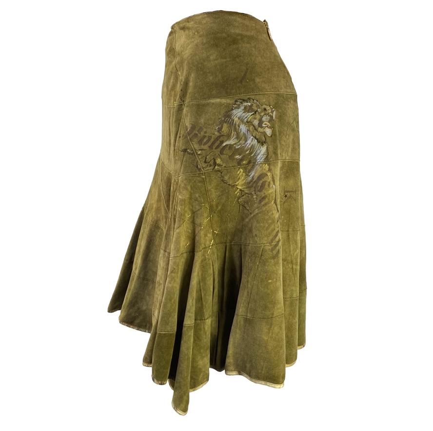 Presenting a stunning astrology print suede skirt, designed by Roberto Cavalli. From 2003, this sought after print features constellations and depicts some of the horoscope signs. The brown paneled suede skirt features the Leo and Scorpio signs on