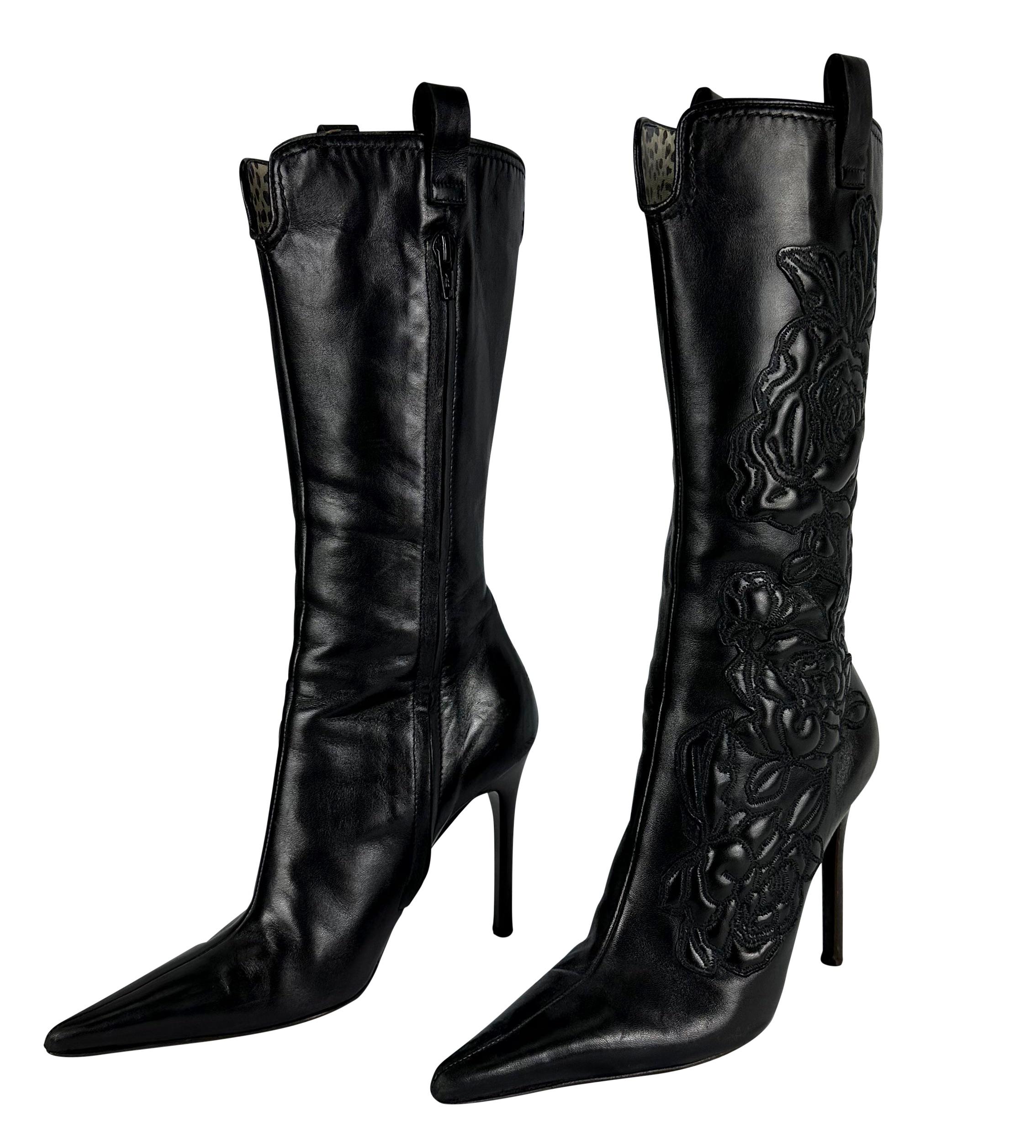 Presenting a fabulous pair of black quilted Roberto Cavalli heeled boots. From 2003, these chic boots feature a quilted rose design, pointed toe, and boot jacks. Add these effortlessly chic boots to your wardrobe! 

Size - 37 IT