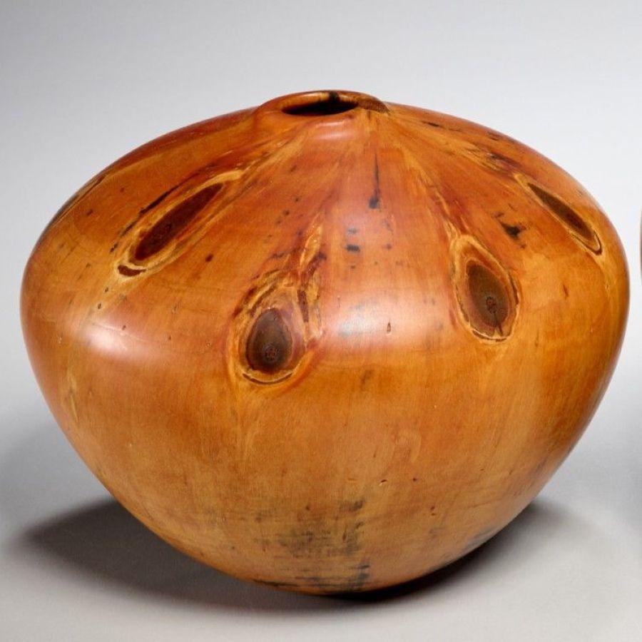 Kelly Dunn (American, b. 1950s)
Pair of Studio Turned Vessels, circa 2003
Norfolk Island Pine, each signed and dated

A striking pair of turned vessels by acclaimed Hawai‘i-based woodturner Kelly Dunn, each crafted from richly figured Norfolk Island