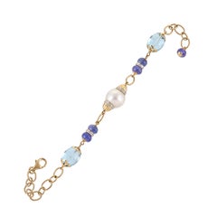 20.04 Carat Blue Topaz Dumbles Tanzanite Beads South Sea Pearl Diamond Bracelet