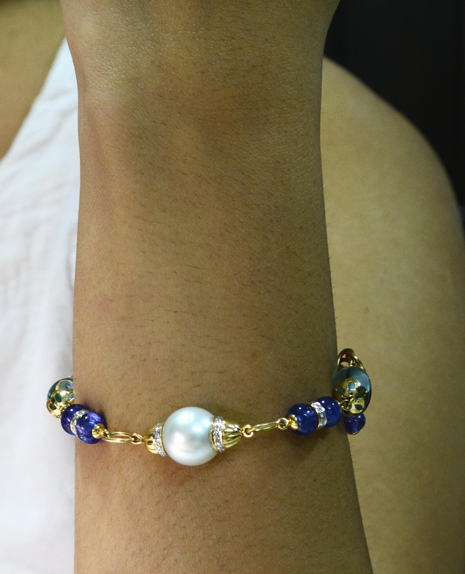 Women's 20.04 Carat Blue Topaz Dumbles Tanzanite Beads South Sea Pearl Diamond Bracelet For Sale
