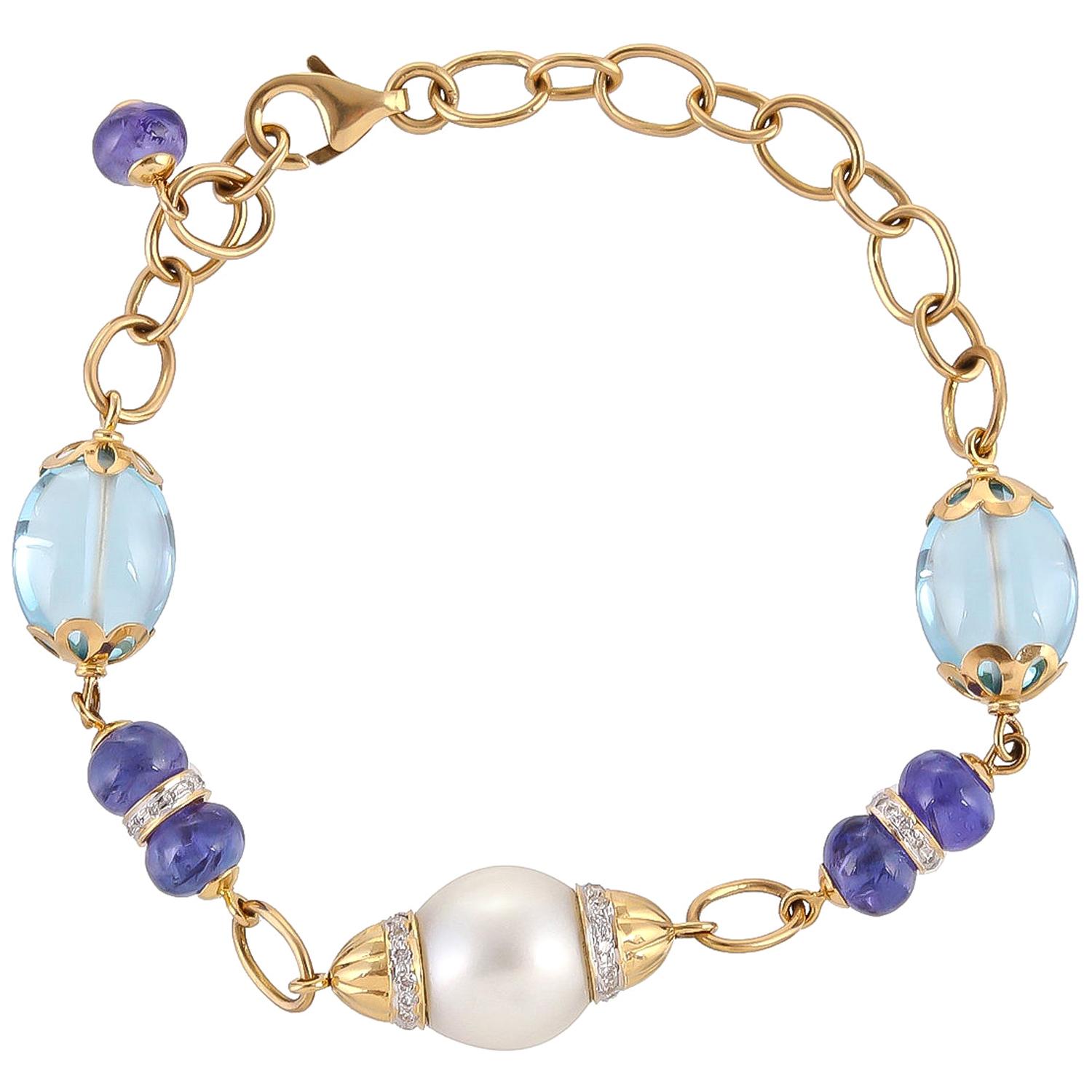 20.04 Carat Blue Topaz Dumbles Tanzanite Beads South Sea Pearl Diamond Bracelet For Sale