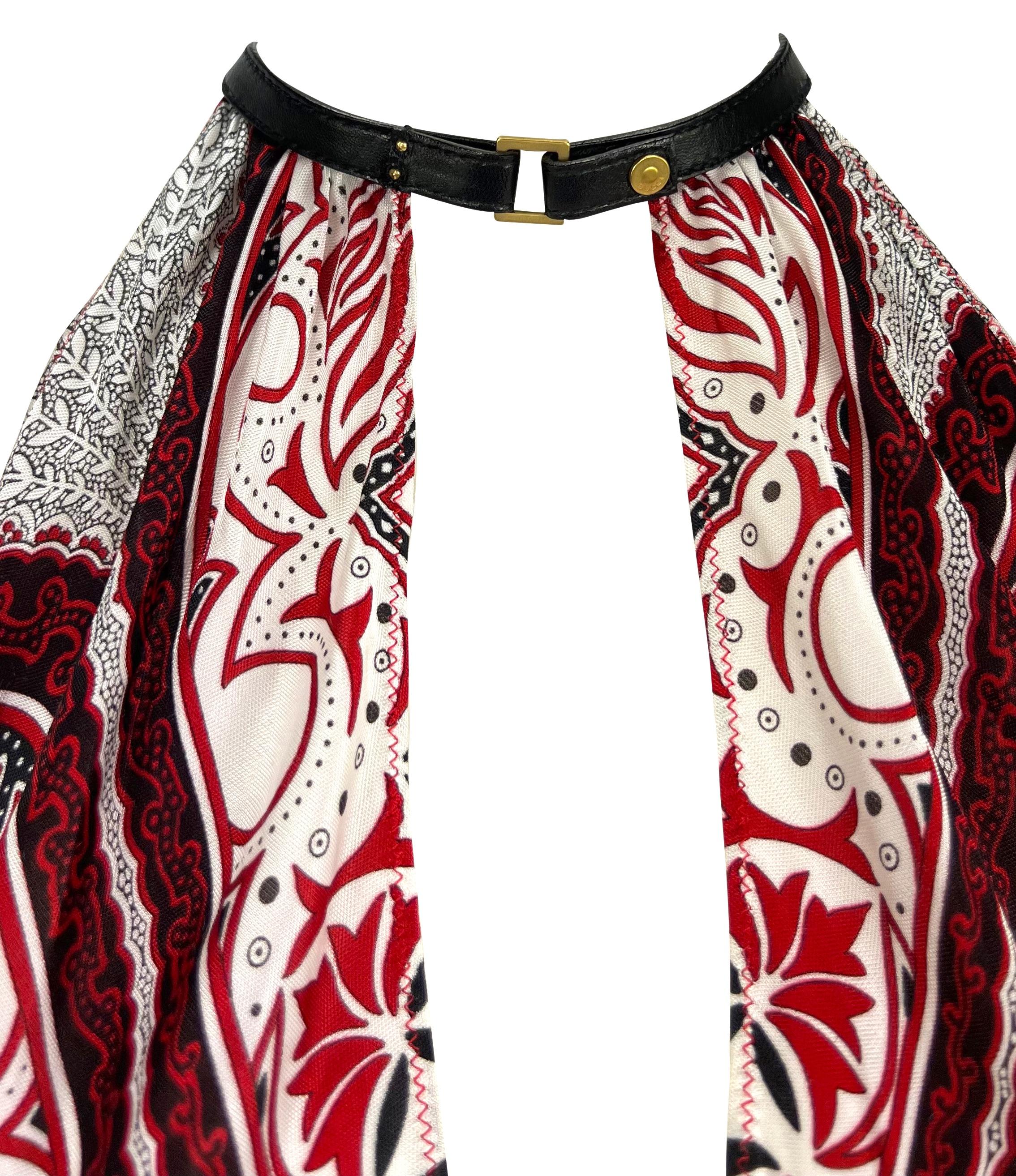Presenting a fabulous red paisley bandana print Gucci halterneck scarf top, designed by Tom Ford. From the 2004 Cruise collection, this top features a plunging neckline, a brown leather halterneck, and is made complete with an exposed tie back.