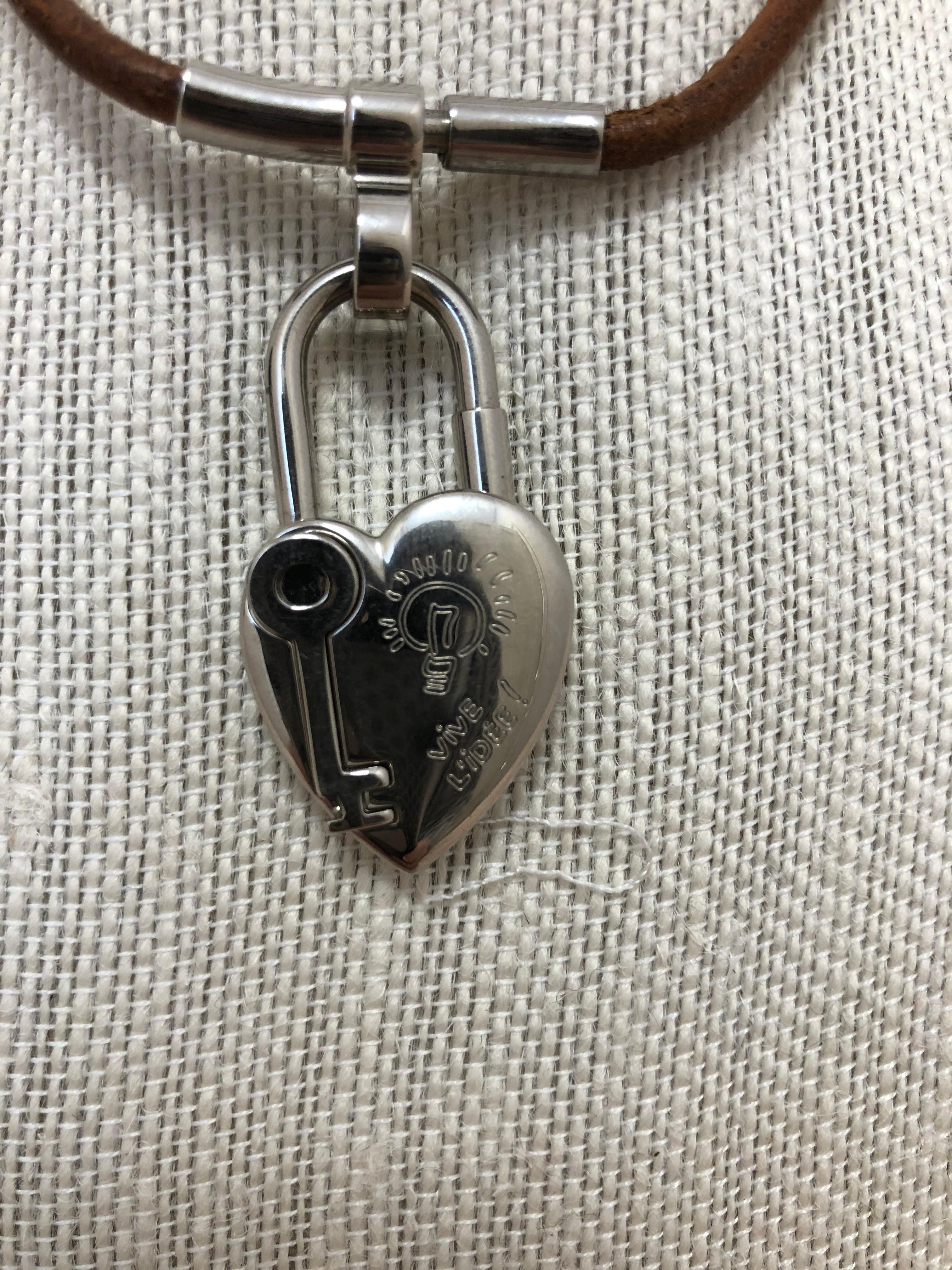 Lovely Hermes heart and key cadena with a leather choker strap. This is the type of necklace you can wear with everything anytime.