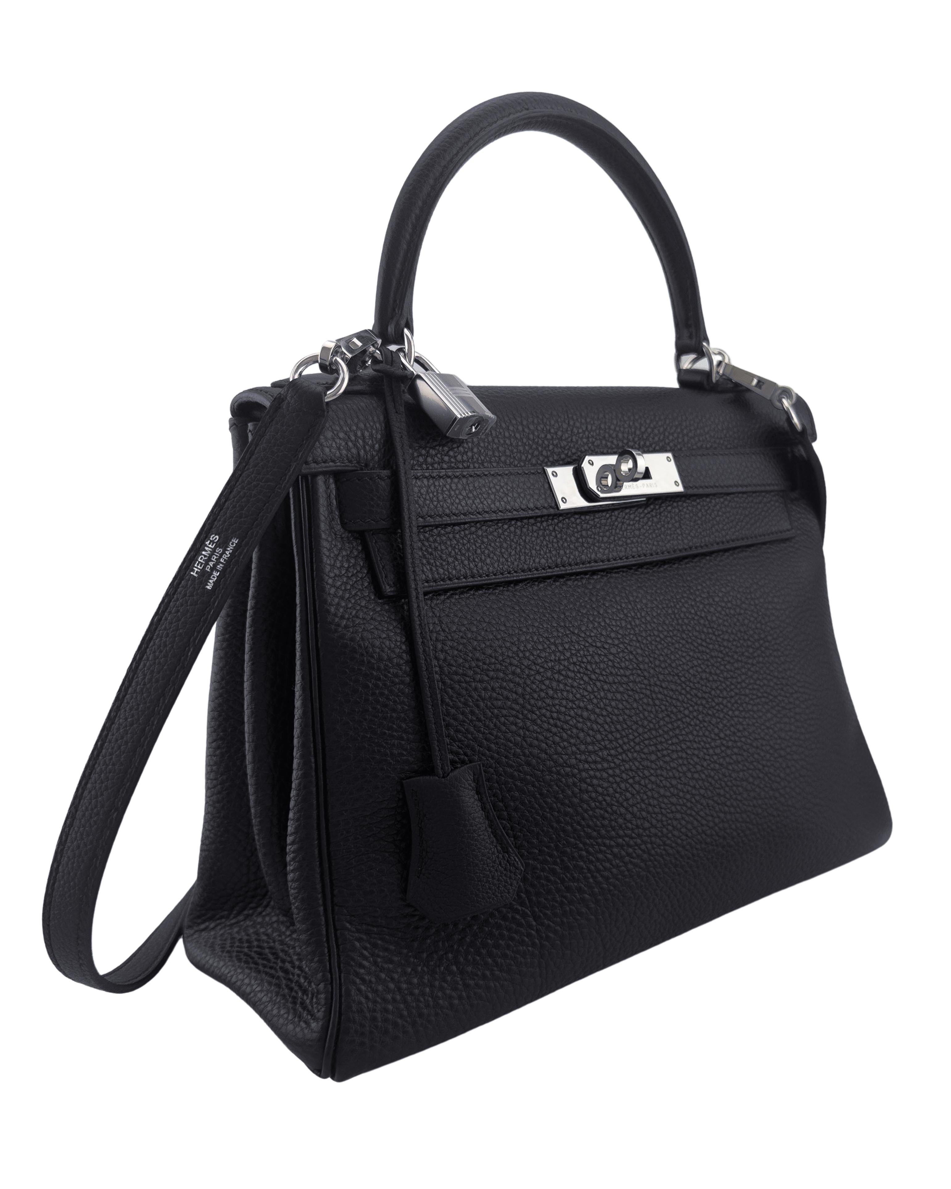 Hermes 28 cm Black Kelly retourne bag in Togo leather, with palladium hardware. Dates from 2004 as shown by the square H blind stamp. Togo leather is a semi-matte smooth, pebbled-grained surface that creates a slightly slouchy and relaxed look. The