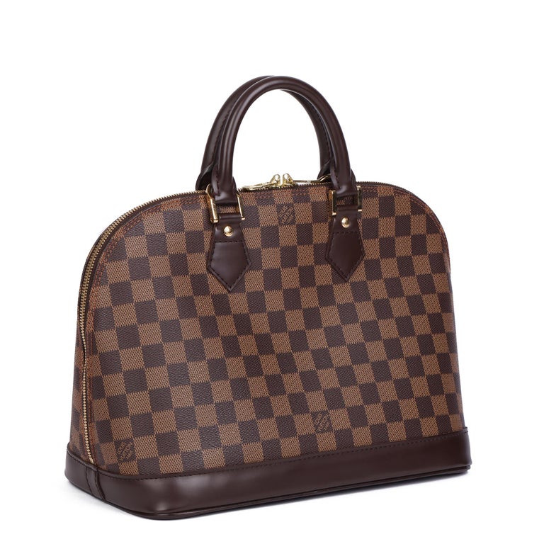 LOUIS VUITTON
Brown Damier Ebene Coated Canvas & Calfskin Leather Alma PM

Xupes Reference: HB4124
Serial Number: BA0024
Age (Circa): 2004
Authenticity Details: Date Stamp (Made in France) 
Gender: Ladies
Type: Tote

Colour: Brown
Hardware: Golden
