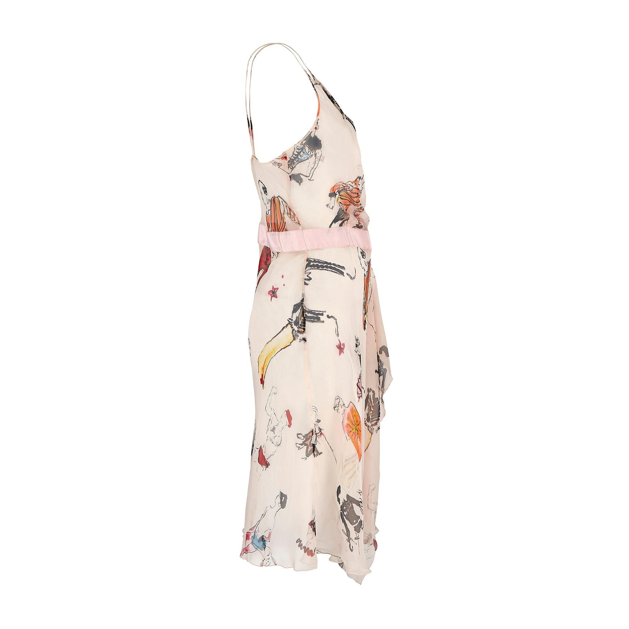 In 1983, Moschino launched Moschino Couture and found enormous success before his untimely death in 1994. He was succeeded by his long time collaborator, Rossella Jardini, who was at the helm when this pretty summer dress was created. It walked the