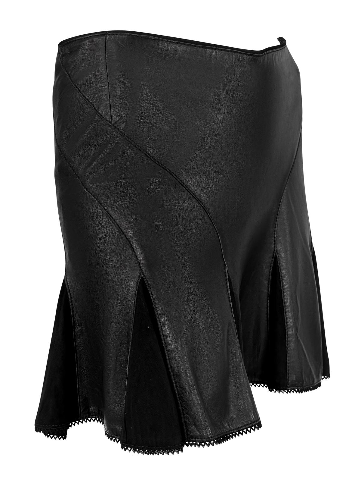 Designed by Roberto Cavalli in 2004, this black leather super mini skirt features suede panel inserts that enhance its flared silhouette. The low-waisted design features strip panels that wrap around the hips and is finished with delicate scalloped