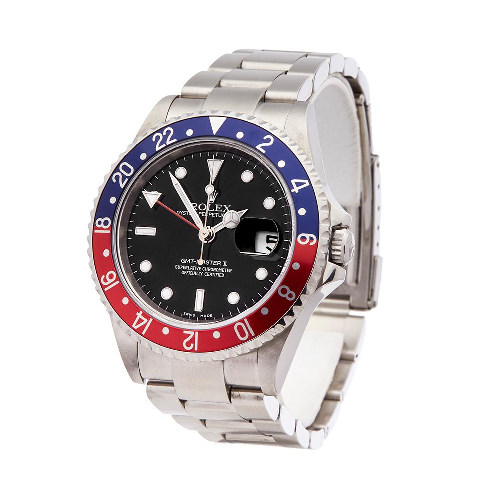 Contemporary 2004 Rolex GMT-Master II Pepsi Stainless Steel 16710 Wristwatch
 *
 *Complete with: Box, Manuals & Guarantee dated 4th March 2004
 *Case Size: 40mm
 *Strap: Stainless Steel Oyster
 *Age: 2004
 *Strap length: Adjustable up to 19cm.