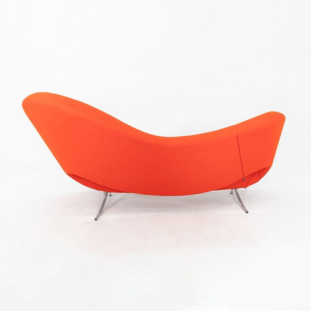 This is a Victoria and Albert Sofa, originally designed by Ron Arad in 2000. This particular example was produced by Moroso in Italy C. 2004. The frame is comprised of reinforced composite fiber and steel and the sofa is upholstered in a red