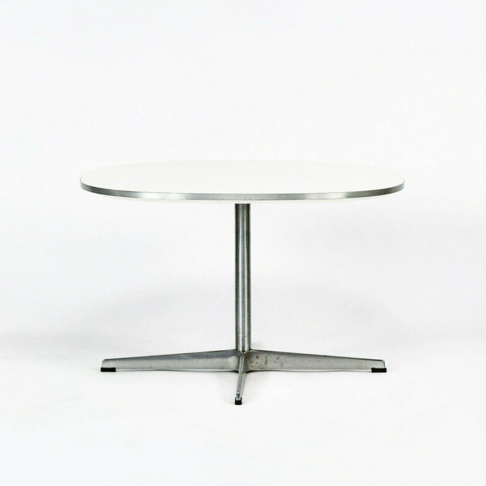 Listed for sale is a Superellipse coffee table (or large end table) by Piet Hein, Arne Jacobsen, and Bruno Mathsson for Fritz Hansen, produced in 2004. This design was originally introduced in 1968 and was part of a collaboration between Hein,