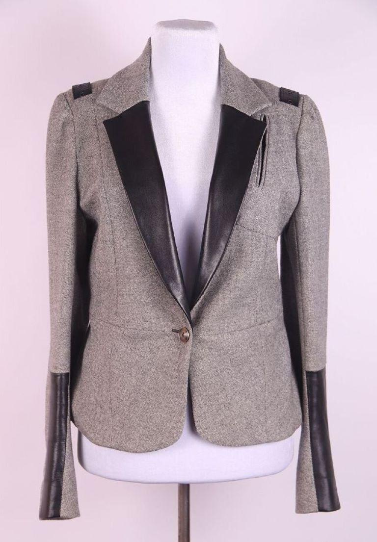2004 John Galliano for Christian Dior jacket

John Galliano for Christian Dior
Collection: Christian Dior 2003
Christian Dior style: 3H12022220
Country of production: France
Marked Size: USA 6 IT 42 FR 38

Material: 92% Wool, 5% Polyamide, 3%