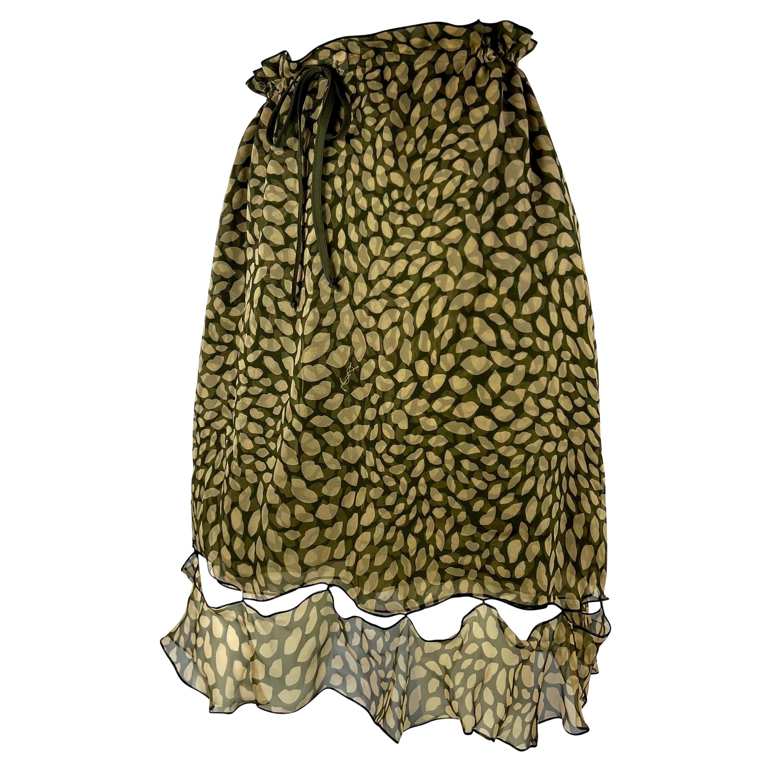 Presenting a semi-sheer green lip print silk skirt designed by Stefano Pilati for Yves Saint Laurent Rive Gauche's 2005 Resort collection. For his first collection as creative director, Pilati took YSL's red lip print from his iconic Spring/Summer