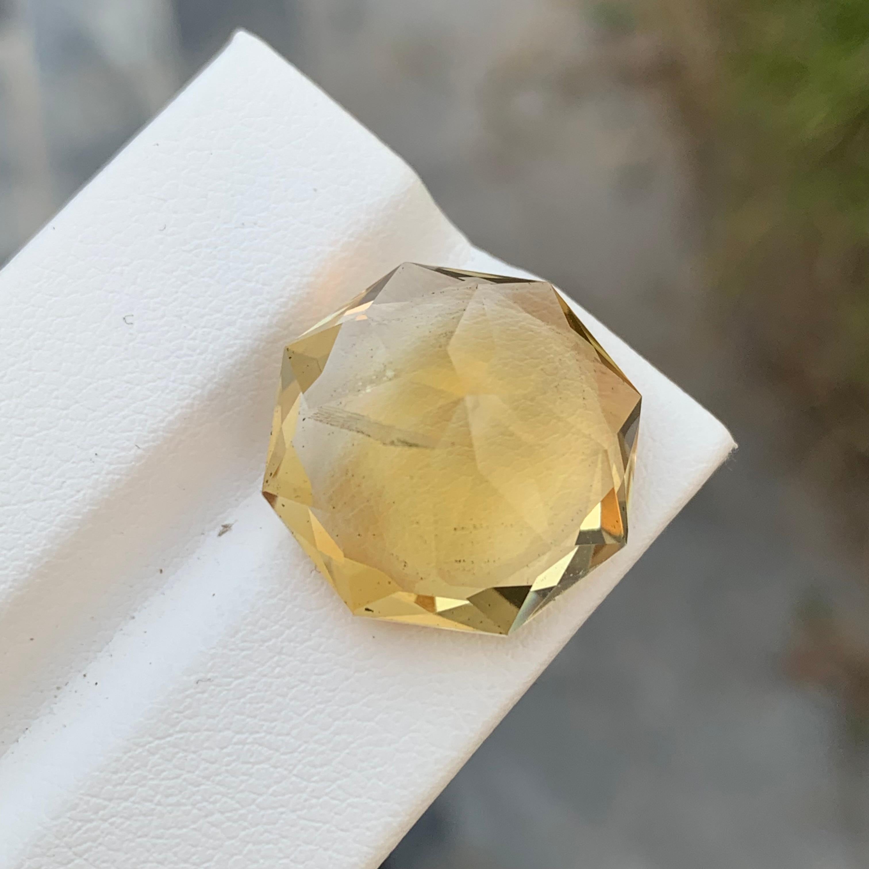Loose Citrine 
Weight: 20.05 Carats 
Dimension: 17.9x17.9x11.7 Mm
Origin: Brazil
Shape: Octagon 
Treatment: Non
Certificate; On Customer Demand 
Citrine is a vibrant yellow gemstone, belonging to the quartz family. Its name is derived from the