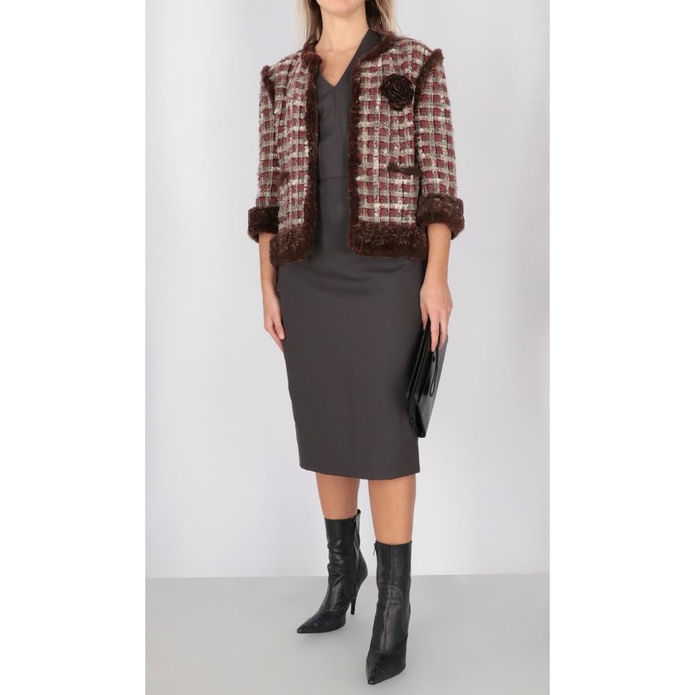 Chanel burgundy and beige silk blend tweed short jacket with check pattern and gold-tone details. Crewneck model, metal hooks front fastening, three-quarter sleeves, patch pockets, brown rabbit fur cuffs and edges. Logoed silk lining. Camelia
