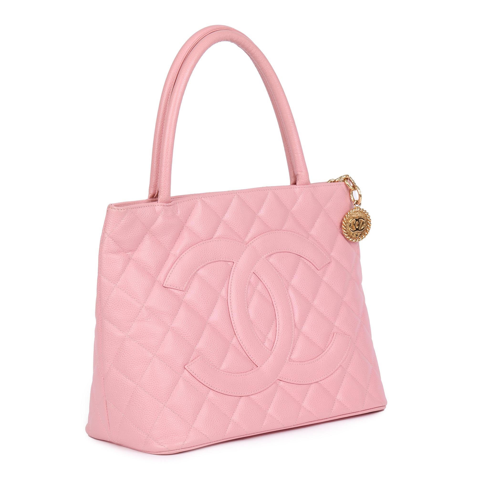 CHANEL
Pink Quilted Caviar Leather Medallion Tote

Xupes Reference: HB4108
Serial Number: 9059374
Age (Circa): 2005
Accompanied By: Chanel Dust Bag, Care Booklet, Authenticity Card
Authenticity Details: Authenticity Card, Serial Sticker (Made in