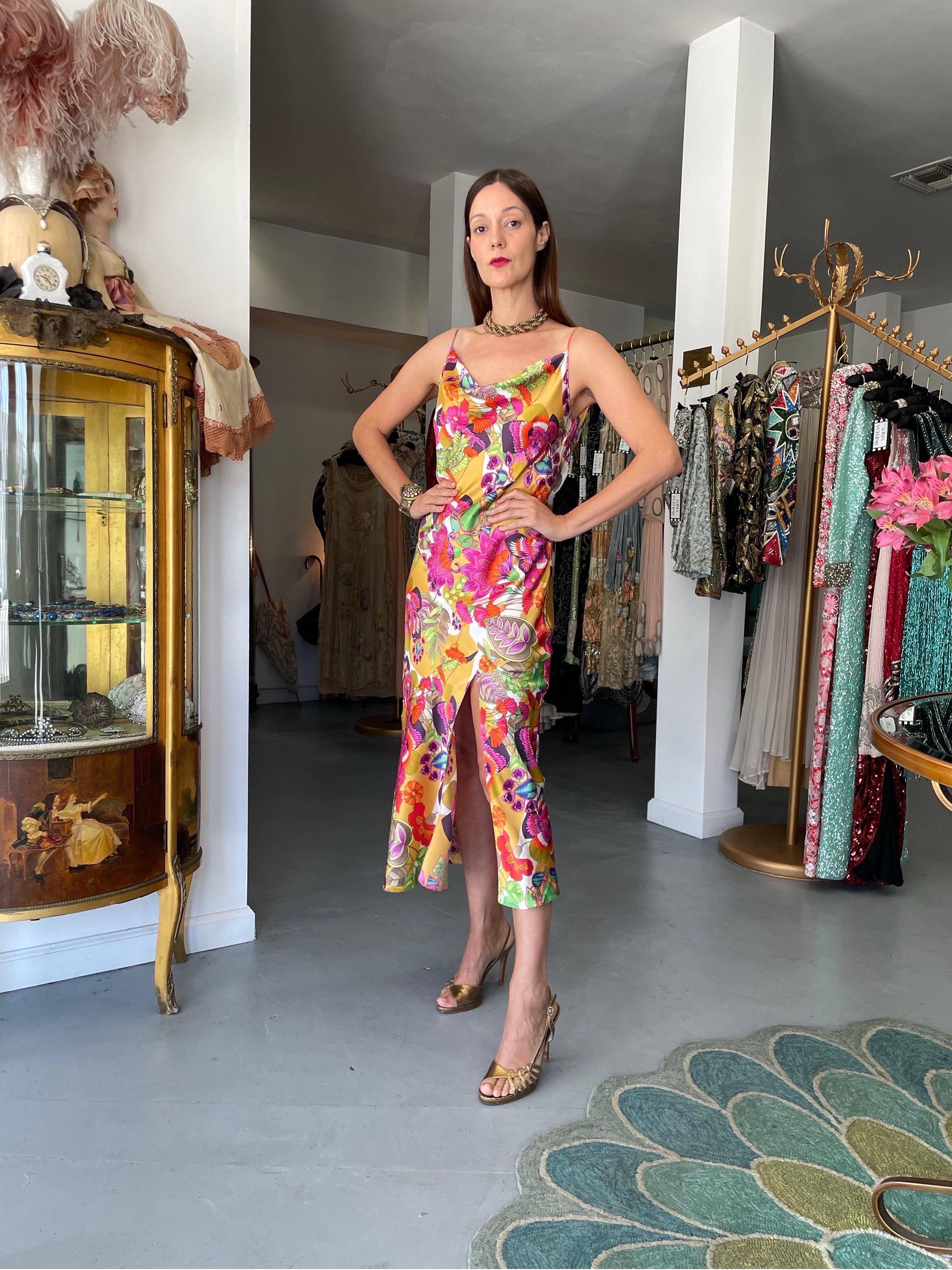 A simply stunning and highly coveted Christian Dior colorful tie-dye floral print silk bias-cut dress. This rare Christian Dior treasure from John Galliano's impressive 2005 spring-summer collection is a perfect example of his genius. John Galliano
