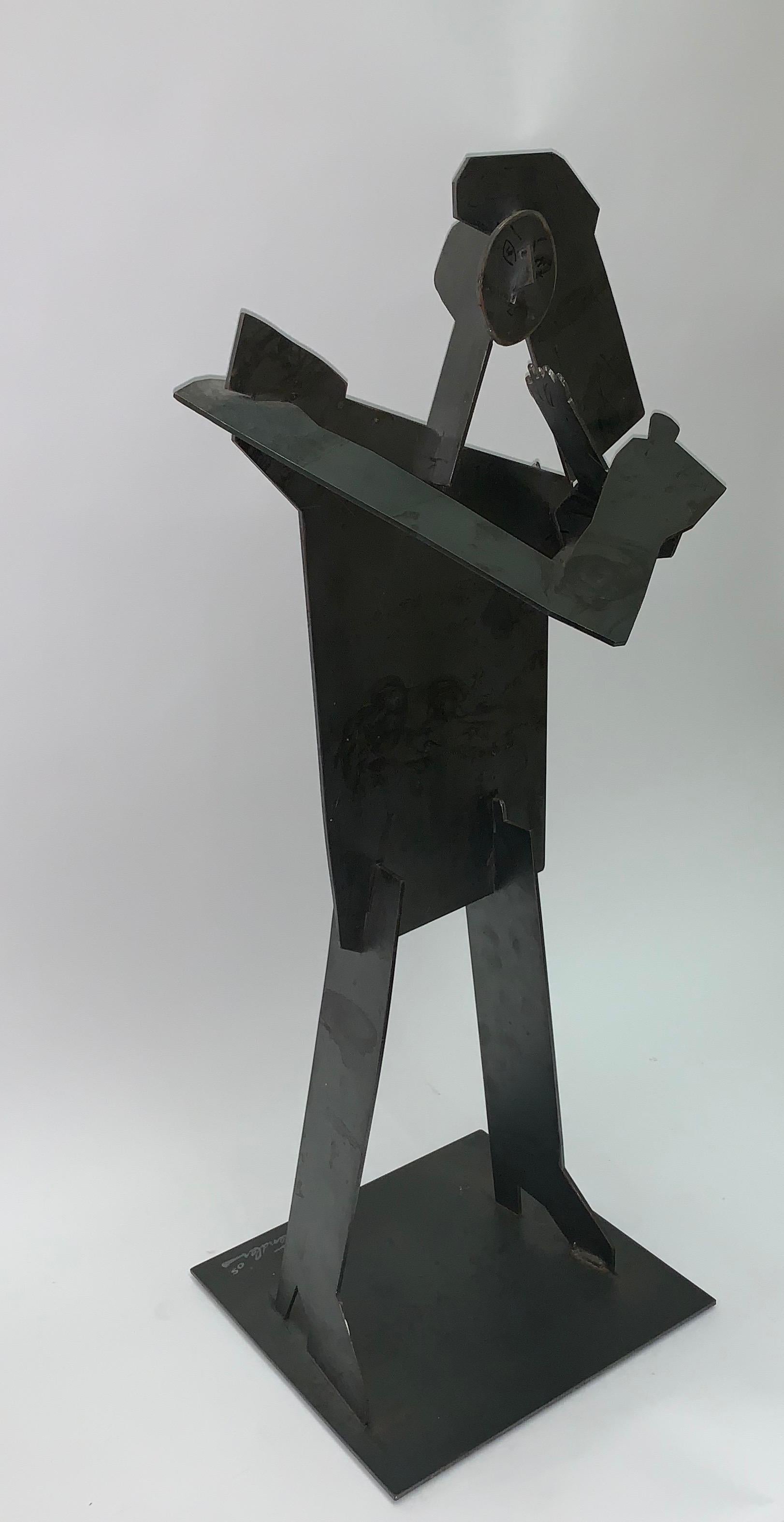 Abstract cubist iron sculpture of a standing figure by the American artist Erin Tendler dated 2005. This sculpture was created by combining various geometric iron shapes. Signed by the artist on the top left corner.

Property from esteemed interior