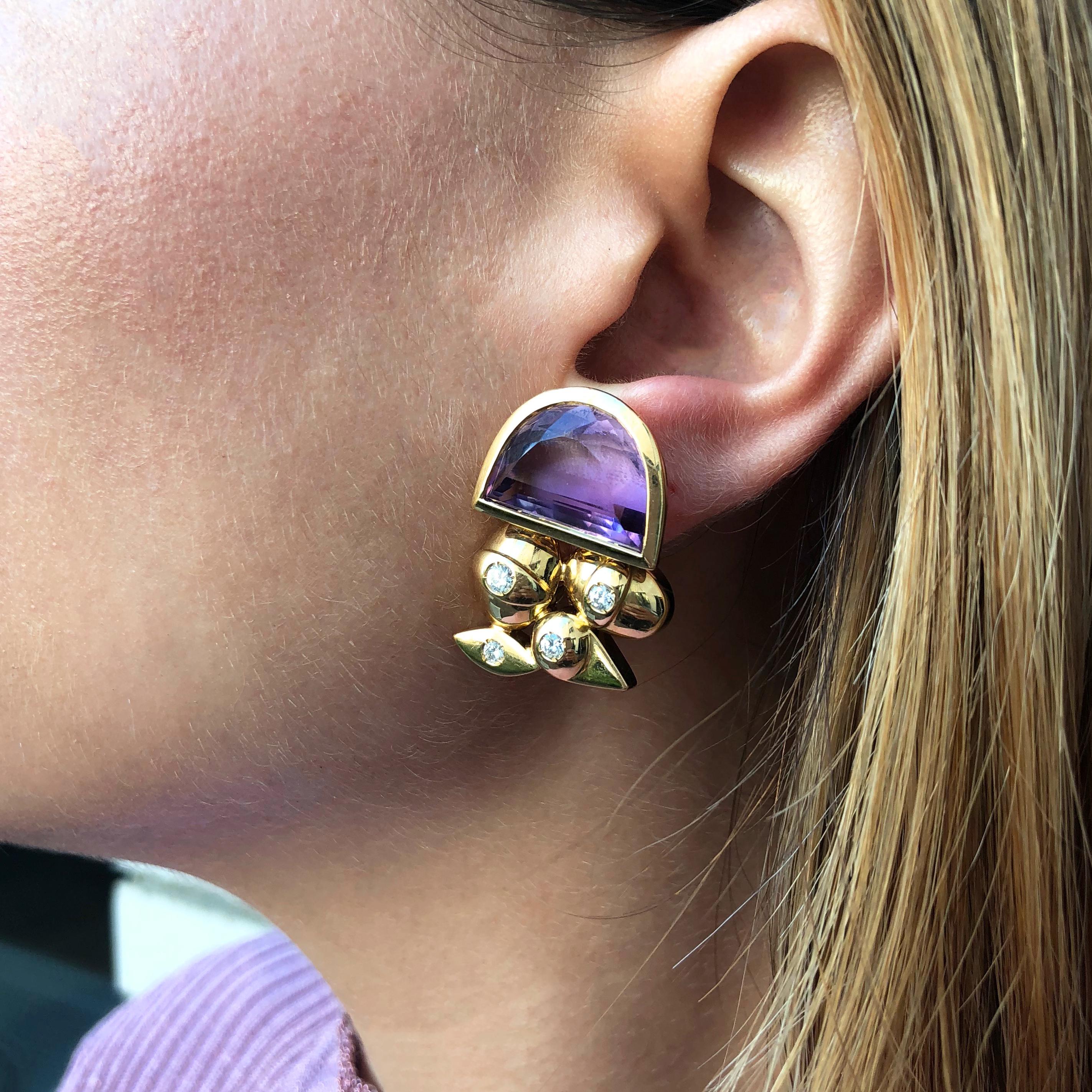 A covetable pair of amethyst, diamond, and 18 karat gold ear clips, by Giorgio Facchini, 2005, Italy. Signed G. Facchini. Stamped 750, Italian hallmarks.
Earrings measure 1.25