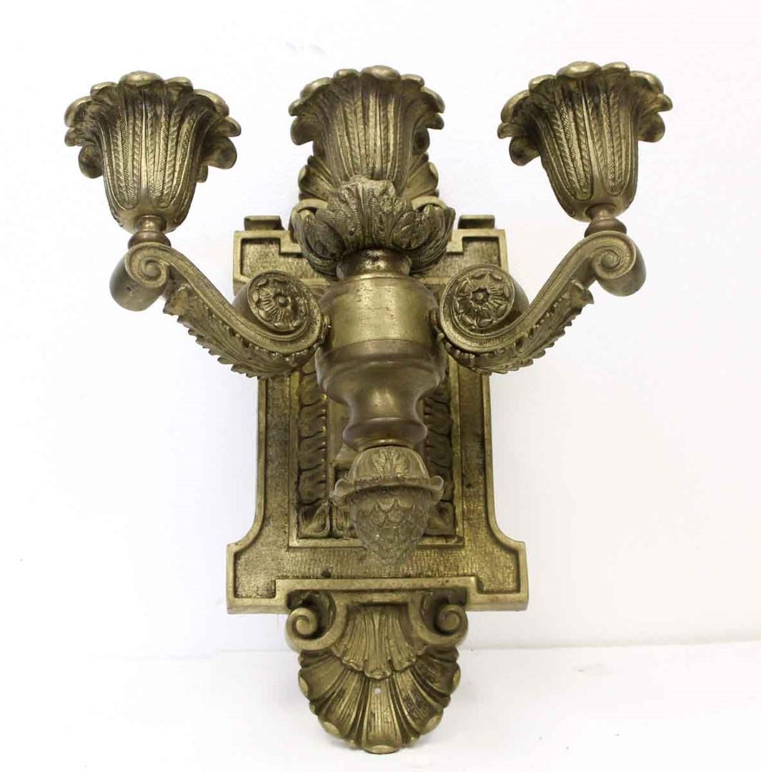Heavy cast bronze three light sconce done in an Empire style. Small quantity available at time of posting. Priced each. Please inquire. Please note, this item is located in our Scranton, PA location.