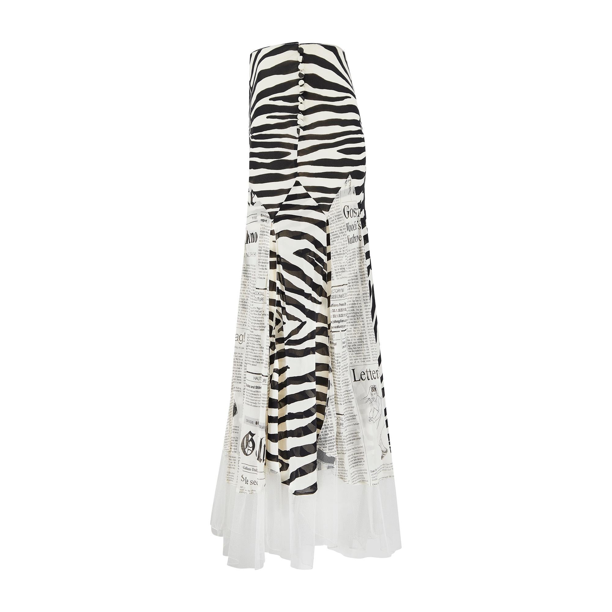 This swirling silk maxi-skirt was designed by John Galliano in his early-2000s heyday and needs no introduction.  Crafted from sheer gossamer silk with silk godet panels around the hem to create fullness and movement. The panels are alternatingly