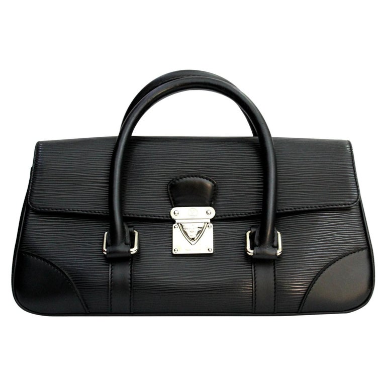 Louis Vuitton Segur Pochette Epi Leather at 1stDibs
