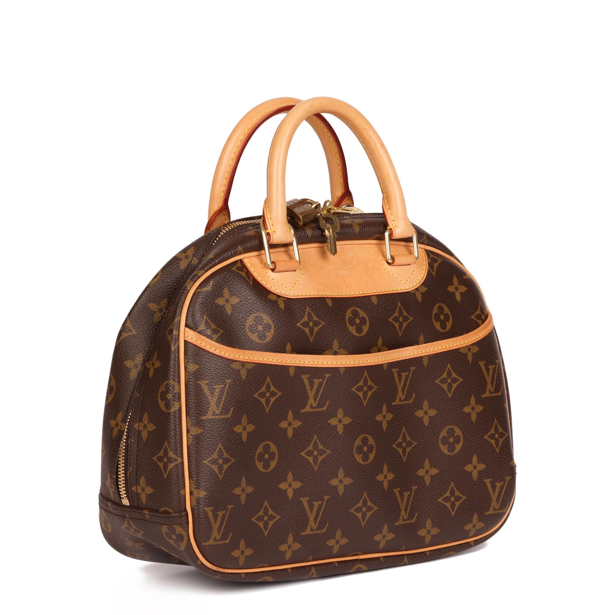 LOUIS VUITTON
Brown Monogram Coated Canvas & Vachetta Leather Trouville

Xupes Reference: CB486
Serial Number: SD0055
Age (Circa): 2005
Accompanied By: Louis Vuitton Dust Bag, Padlock, Keys
Authenticity Details: Date Stamp (Made in France)
Gender: