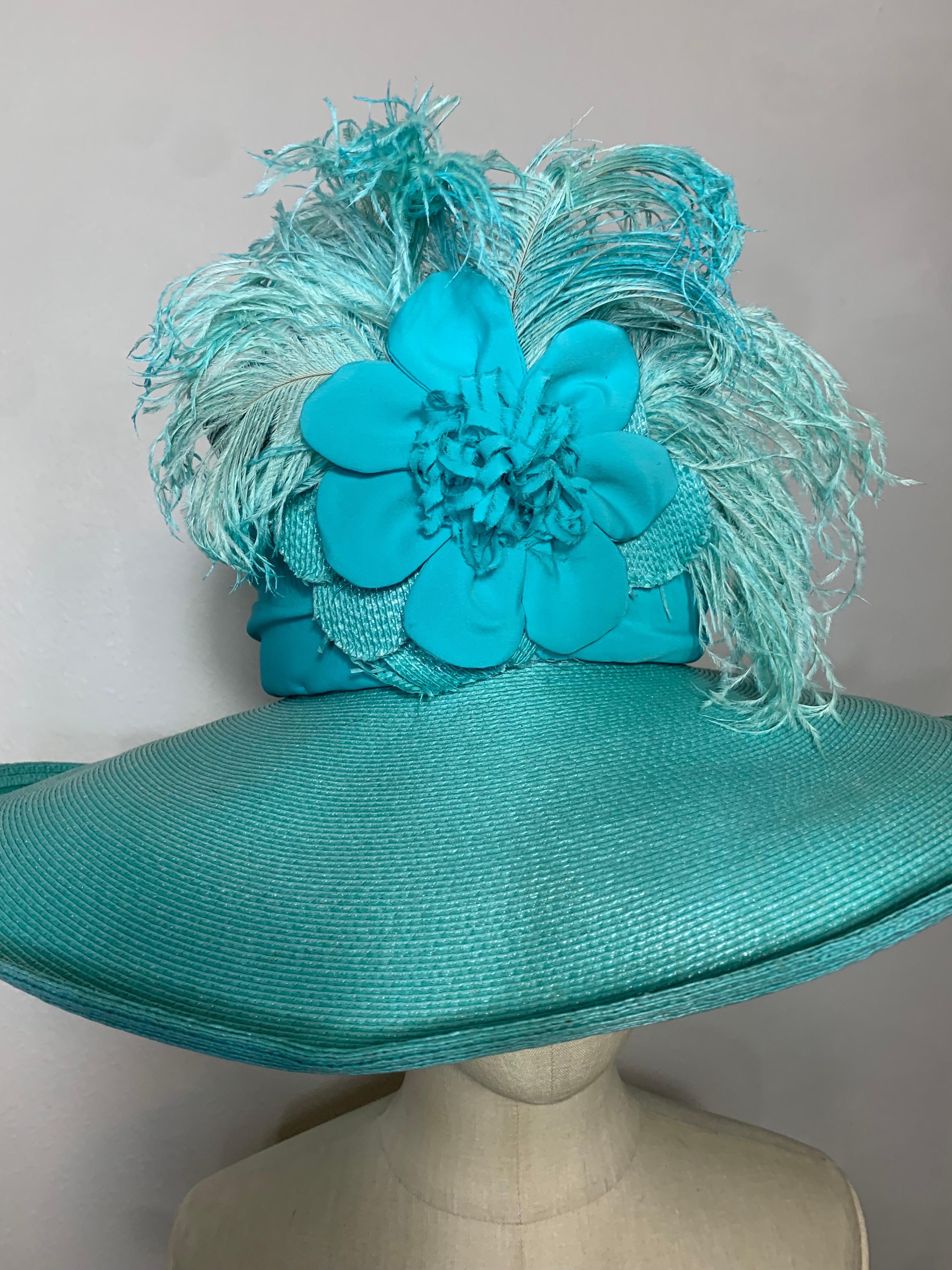 2005 Spring/Summer Maison Michel Aqua Milanese Straw Wide Brim Hat w Extravagant Feather & Floral Trim: Beautiful custom-made straw hat with high rounded crown, wide contrasting fabric band and multi-fabric floral and ostrich feather embellishments