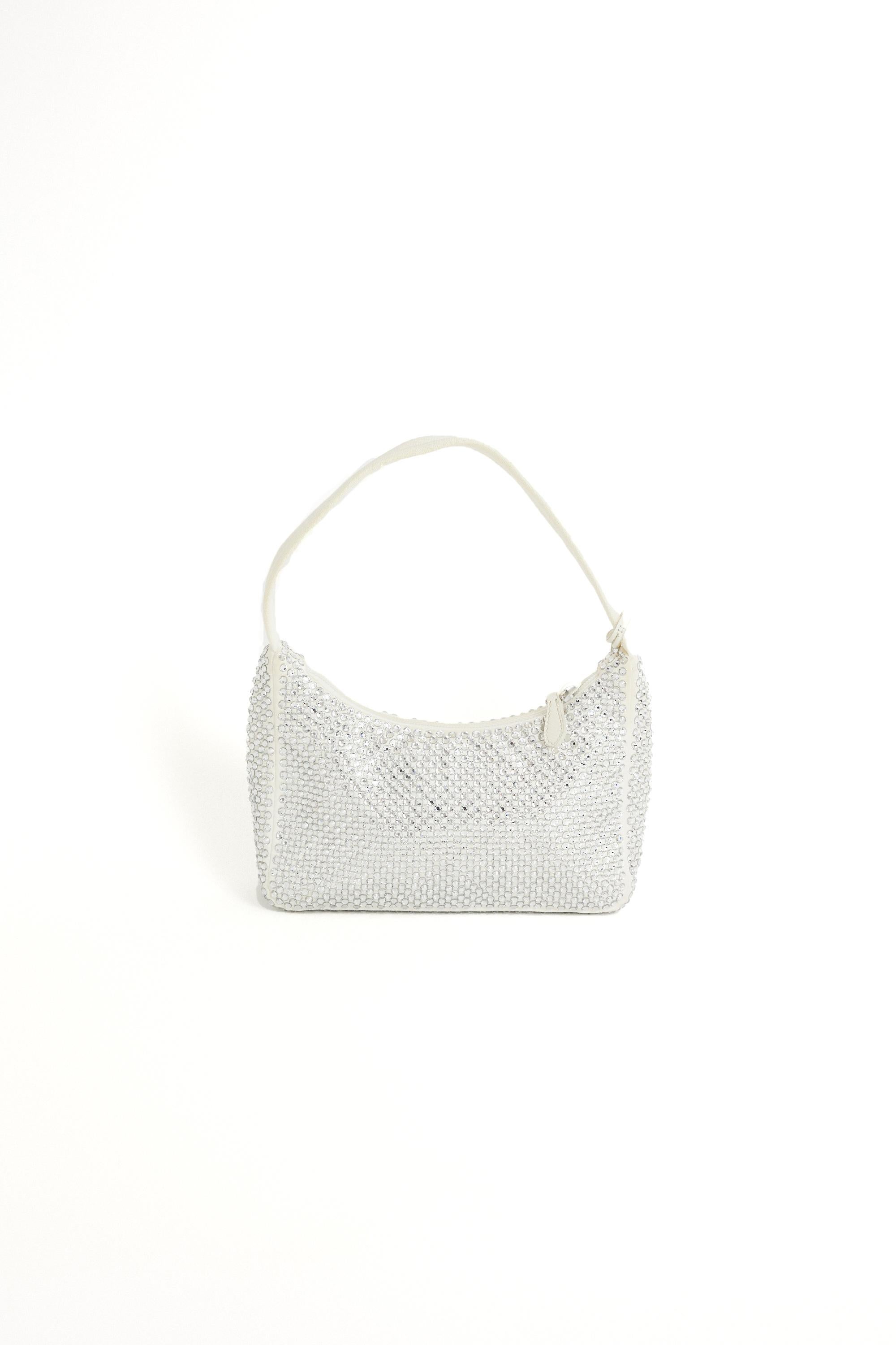 Prada 2005 re-edition crystalised hobo bag. Features Prada hardware, all over crystals and zip closure. Pre-loved, in excellent condition.
Brand: Prada
Color: White
2005
Hobo Bag
Fabric: Fabric
Dustbag: Yes
Serial Number: 31 43
Measurements: Length: