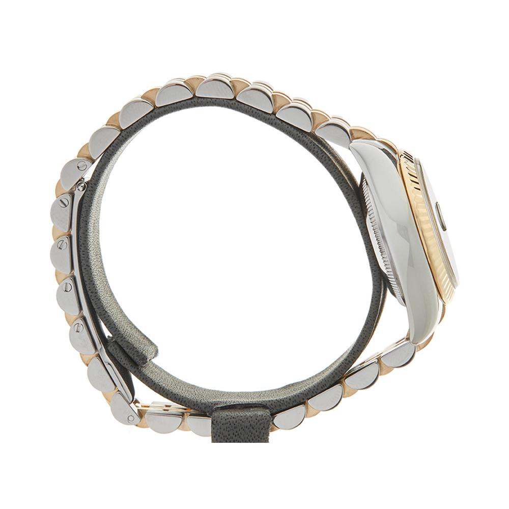 Contemporary 2005 Rolex Datejust Steel & Yellow Gold 179173 Wristwatch
 *
 *Complete with: Box Only dated 2005
 *Case Size: 26mm
 *Strap: Stainless Steel & 18K Yellow Gold Jubilee
 *Age: 2005
 *Strap length: Adjustable up to 17cm. Please note we can