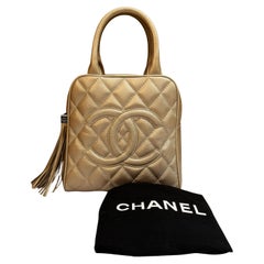 2005 Vintage CHANEL Quilted Caviar Bowler Bag Small Metallic Champagne