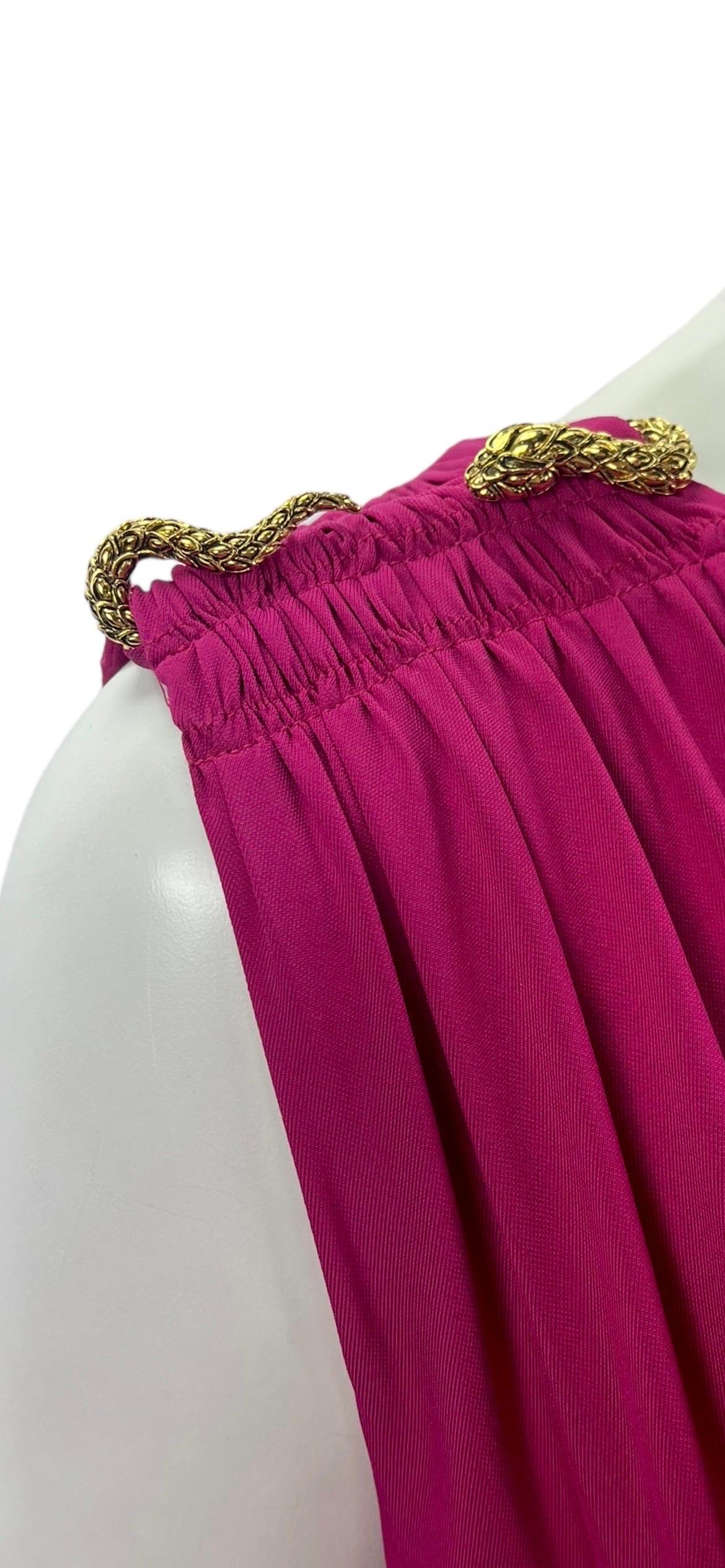 2005 Vintage Roberto Cavalli 
Fuchsia Pink Dress with gold Snake details (removable)
IT Size 44 - US 8
Jersey, stretchy, self-lined, with soft bra inside
Made in Italy
Immaculate condition. Tags attached.

Shown with vintage Gianni Versace chain