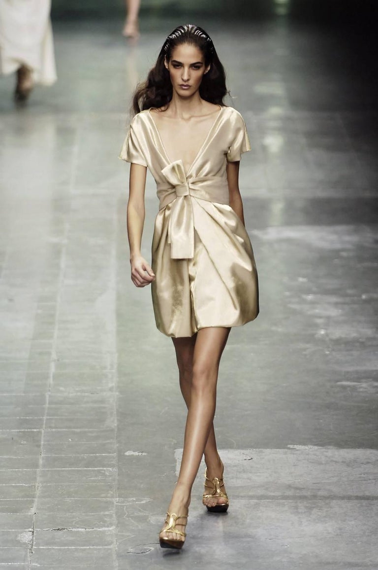 2006 ALEXANDER MCQUEEN cream silk runway dress with bow detail at ...