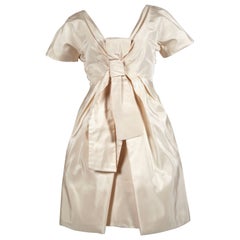 2006 ALEXANDER MCQUEEN cream silk runway dress with bow detail