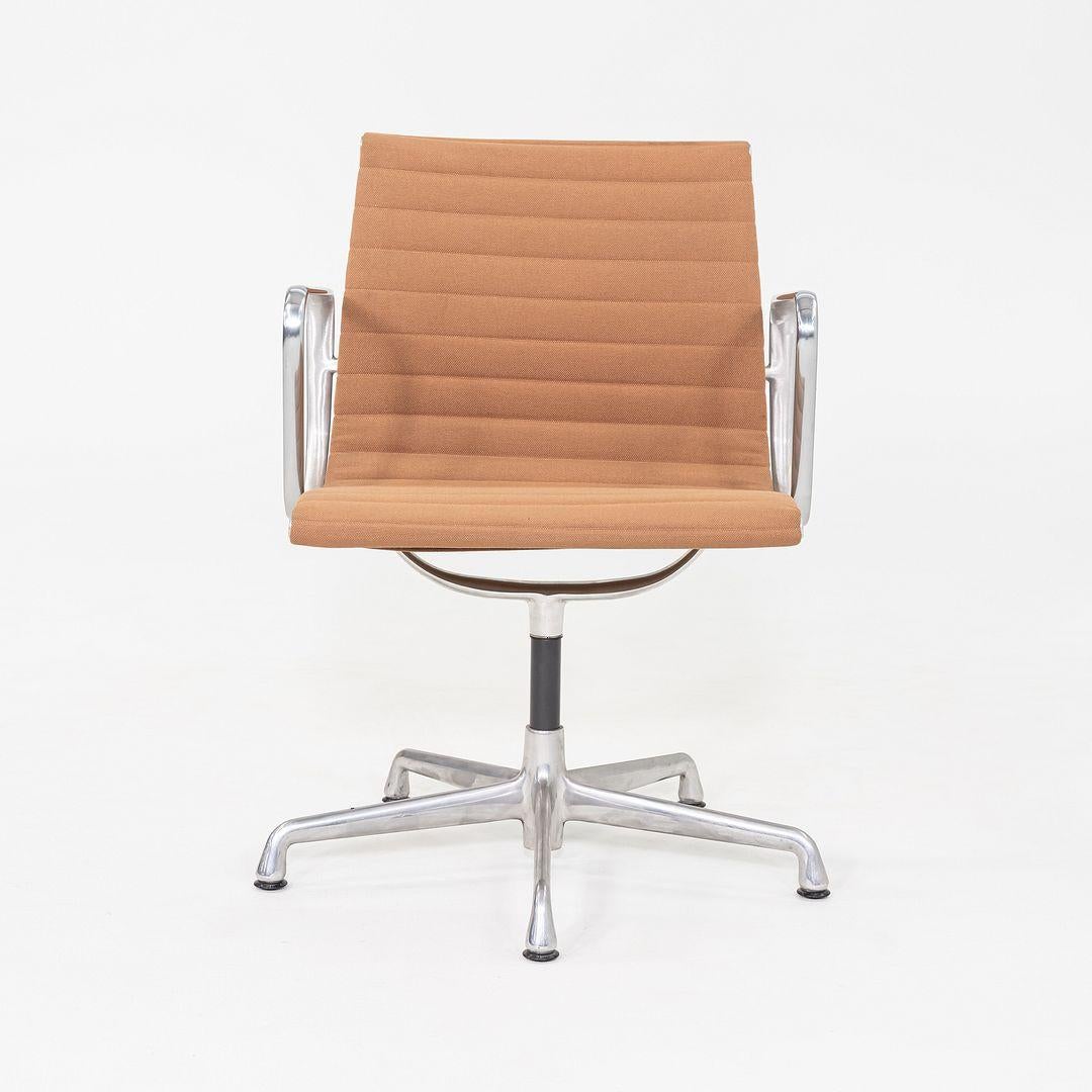This is an Eames Aluminum Group Management Desk Chair, originally designed by Charles and Ray Eames for Herman Miller in 1958. These particular examples date to 2006. Their design includes a solid yet lightweight aluminum frame with a 5-star antler