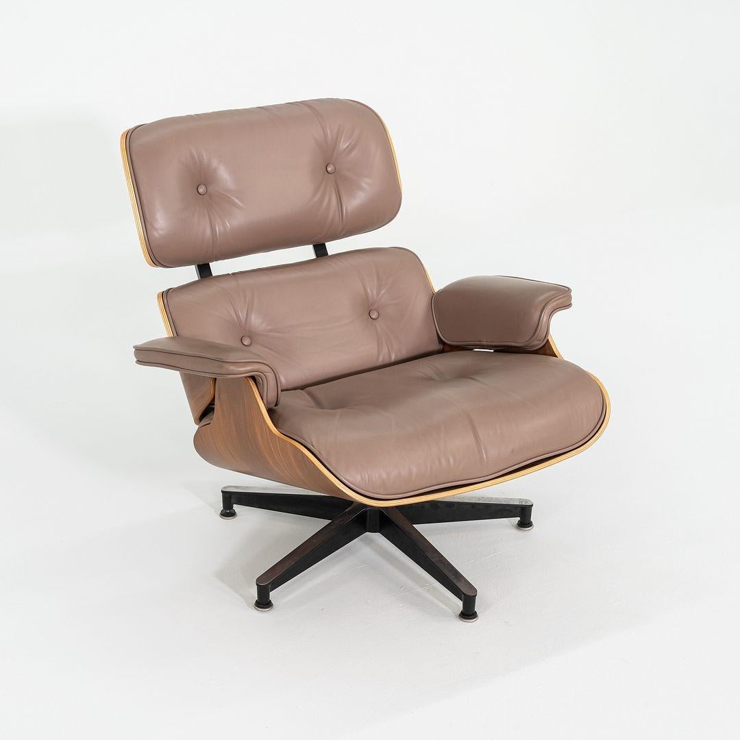 This is an Eames Lounge Chair and Ottoman, models 670 and 671, designed by Charles and Ray Eames for Herman Miller in 1956. This particular example dates to 2006 and has the 50th Anniversary labels on it. These pieces are comprised of