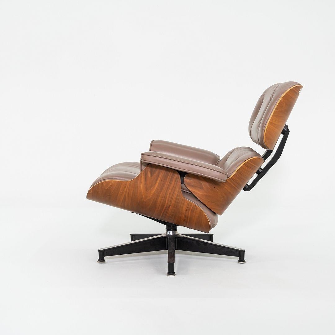 Modern 2006 Herman Miller Eames Lounge Chair and Ottoman in Tan Leather and Walnut