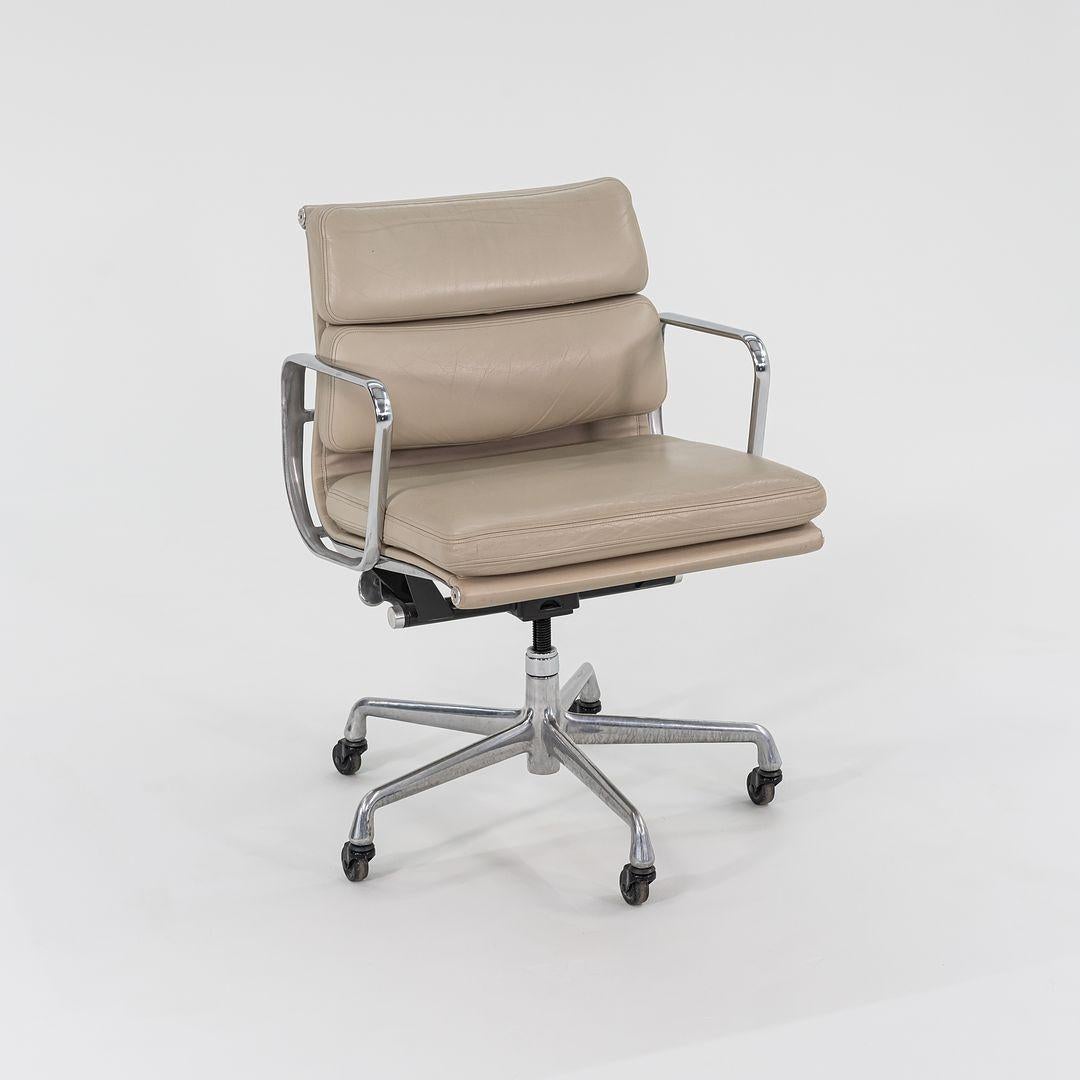 These are Eames Aluminum Group Soft Pad Management Desk Chairs, Model EA435, designed by Charles and Ray Eames for Herman Miller in 1969. These examples date to 2006. The listed price includes one chair, and we have several available for purchase.