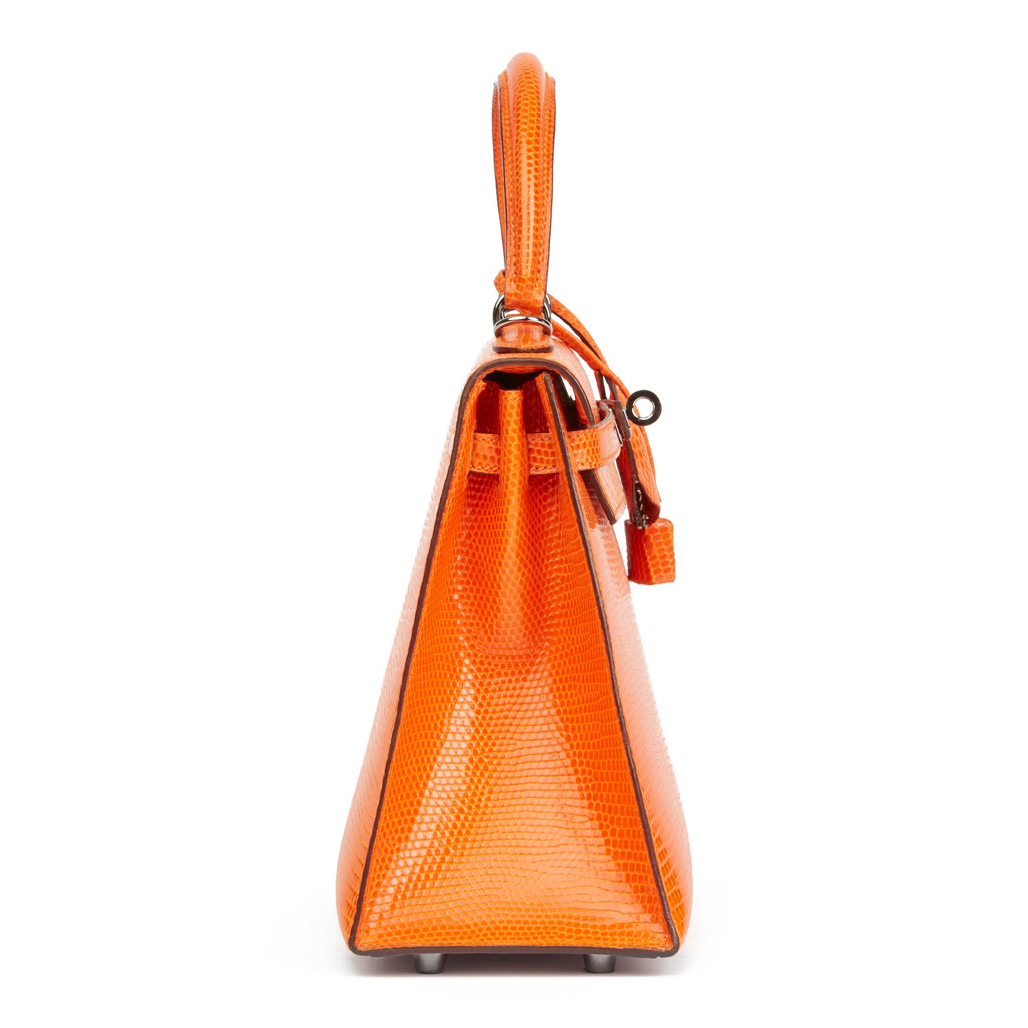 HERMÈS
Tangerine Shiny Niloticus Lizard Leather Kelly 25cm Sellier

 Reference: HB2874
Serial Number: [J]
Age (Circa): 2006
Accompanied By: Hermès Dust Bag, Lock, Keys, Clochette, Care Booklet, Shoulder Strap
Authenticity Details: Date Stamp (Made