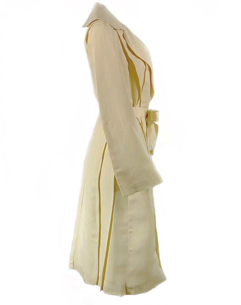 2006 LANVIN Cream/ Ivory Linen Coat Size 40

Product details:
Size 40
63% Paper, 37% Silk
One pocket on each side
Belt measures 63 inches long and 1.5 inches wide
Sleeves measure 25 inches long from the shoulder and 8.5 inches wide 
Made in France
