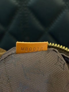 2006 Louis Vuitton Sac hobo Mahina Onatah GM en daim marron