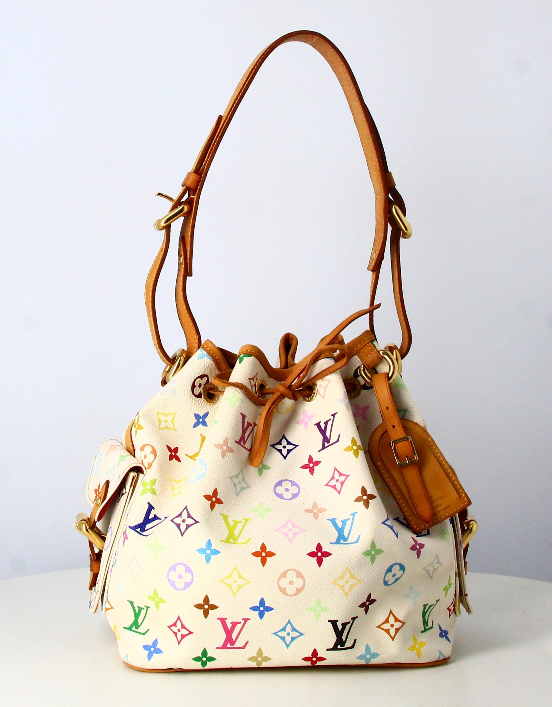 2006 Noé Multicolore Handbag Louis Vuitton Canvas Monogram 

- Good condition. Shows very slight signs of wear over time. 
- Louis Vuitton Handbag
- Multicolour white monogram 
- Brown leather hanse 
- Two small pockets on the side 
- Inside:
